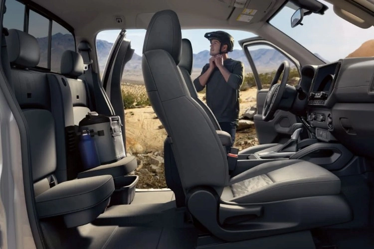 Open trunk of red Nissan Altima showing cargo space