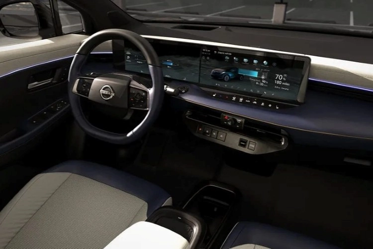 Nissan LEAF steering wheel in front of the full-width Monolith display