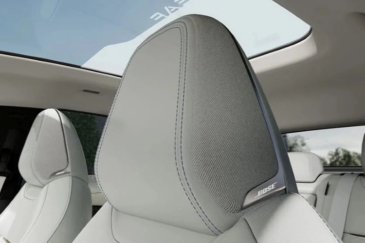 Close-up of a Nissan LEAF front headrest housing the built-in Bose speakers