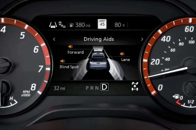 Nissan Frontier instrument cluster showing the Advanced Drive-Assist Display between the gauges