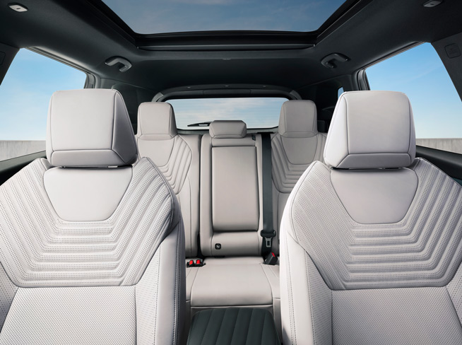 Nissan interior with white seats and panoramic roof