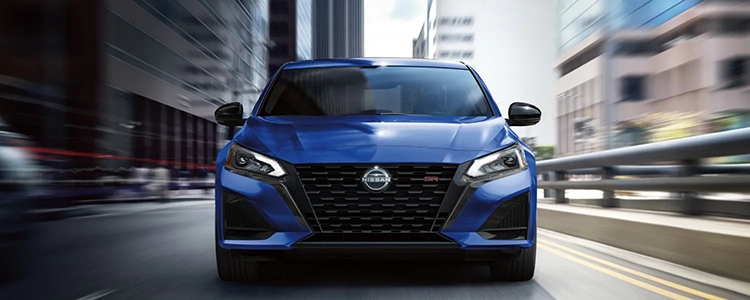 Blue 2025 Nissan Altima Driving in City