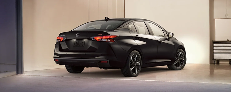 Back Three-Quarters of a Black 2025 Nissan Versa®