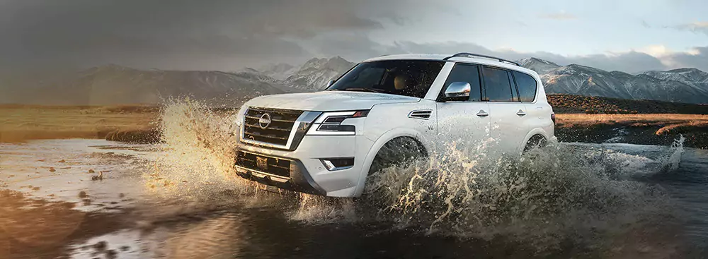 White Armada driving through water